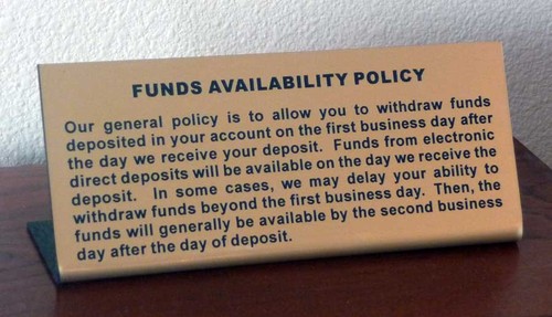 Funds Availability Policy sign, easel base 7